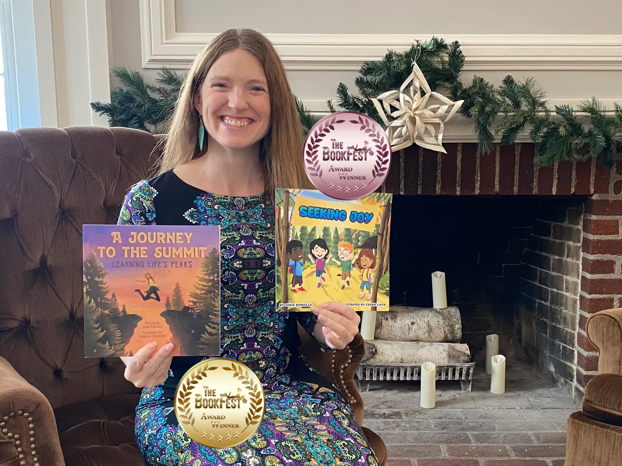 Jodie Bonville holding her two BookFest award-winning books, Seeking Joy and Journey to the Summit