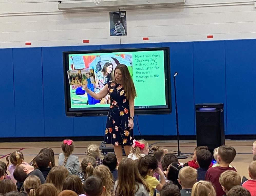 Jodie Bonville presenting Seeking Joy to a school audience