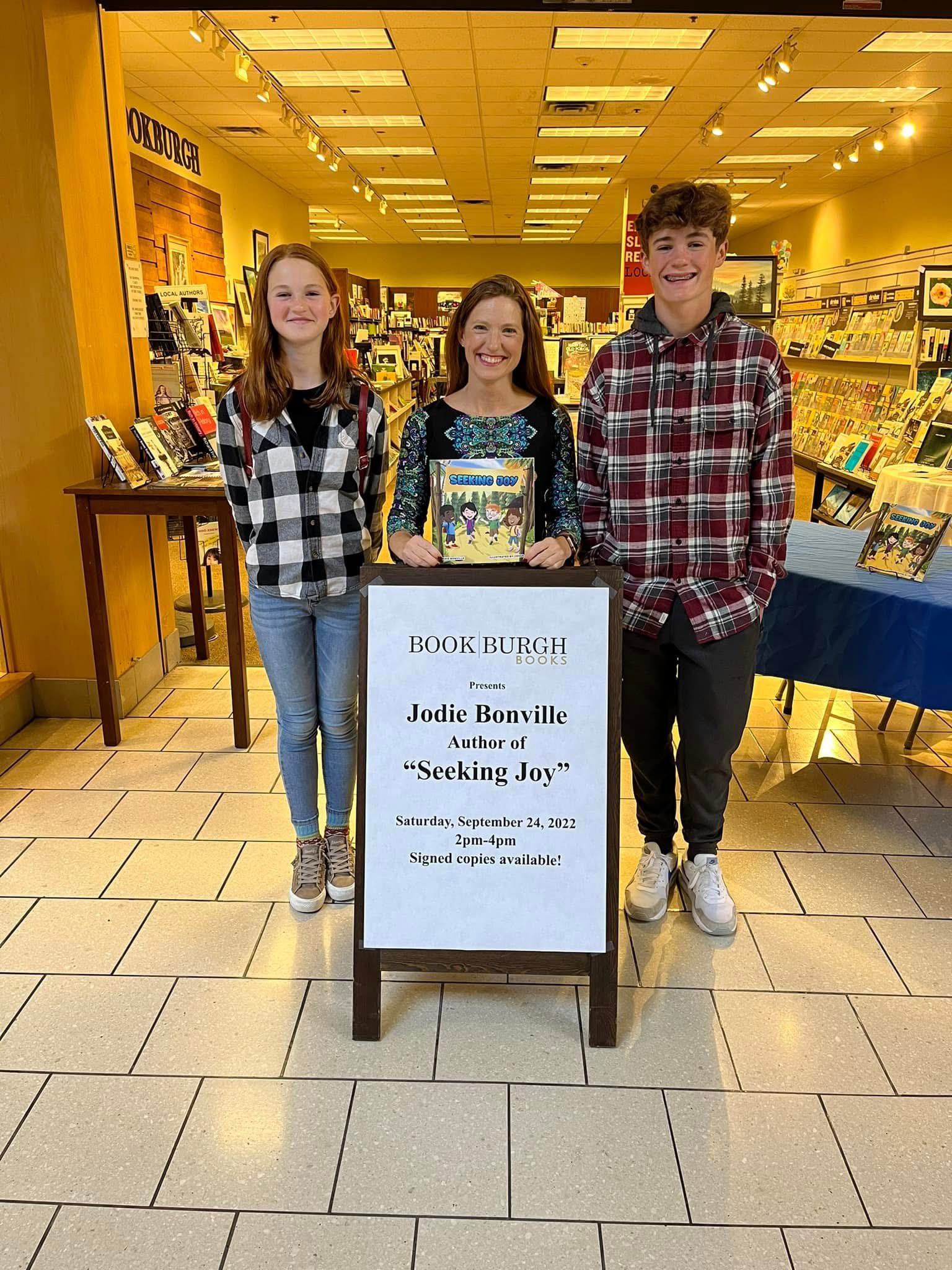 Jodie Bonville at a Book Burgh book signing event for Seeking Joy